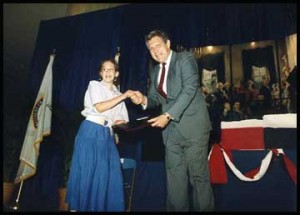 B-side host Mia Lobel gets an early introduction to politics in 1986 after winning a "What the Constitution Means to Me" national essay contest. She is seen here with Reagan's Secretary of Education, William Bennett. 